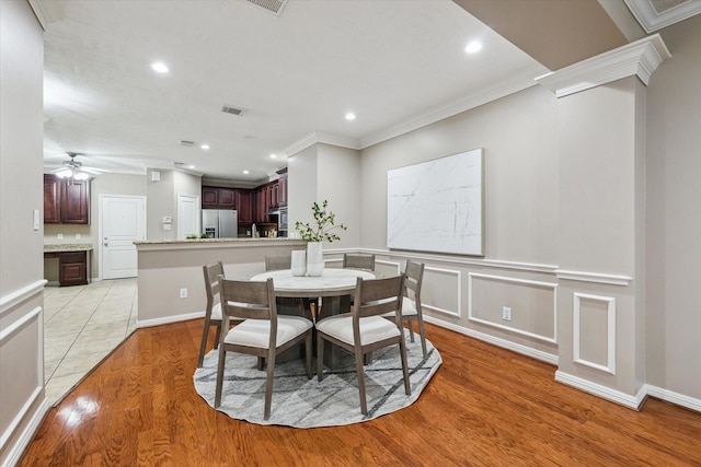 1339 Ella Pl, Houston, TX 77008 - dining area with ornamental molding, light wood-type flooring, recessed lighting, and ceiling fan