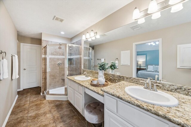 1339 Ella Pl, Houston, TX 77008 - bathroom featuring ensuite bath, double vanity, a stall shower, and tile patterned floors