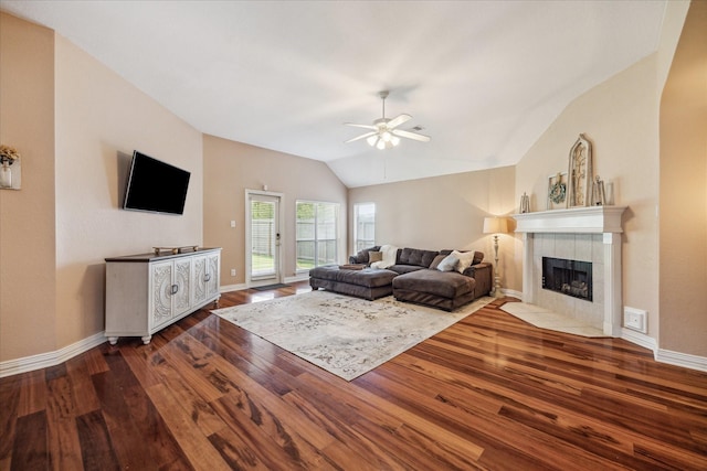 7206 Broadelm Dr, Houston, TX 77095 - living area with wood finished floors, ceiling fan, a tile fireplace, and lofted ceiling