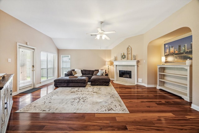7206 Broadelm Dr, Houston, TX 77095 - living area featuring a ceiling fan, a tile fireplace, lofted ceiling, and dark wood finished floors