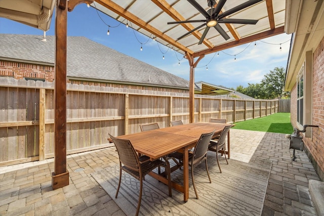 7206 Broadelm Dr, Houston, TX 77095 - fenced backyard with outdoor dining area, a patio area, and ceiling fan