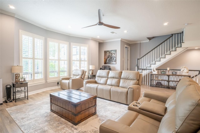 503 Detering St, Houston, TX 77007 - living room with a ceiling fan, light wood-type flooring, recessed lighting, ornamental molding, and stairs