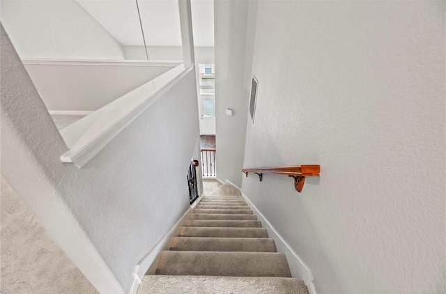 8814 Silent Willow Ln, Sugar Land, TX 77479 - stairway with a textured wall