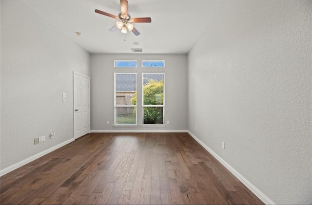 8814 Silent Willow Ln, Sugar Land, TX 77479 - empty room featuring dark wood finished floors and a ceiling fan