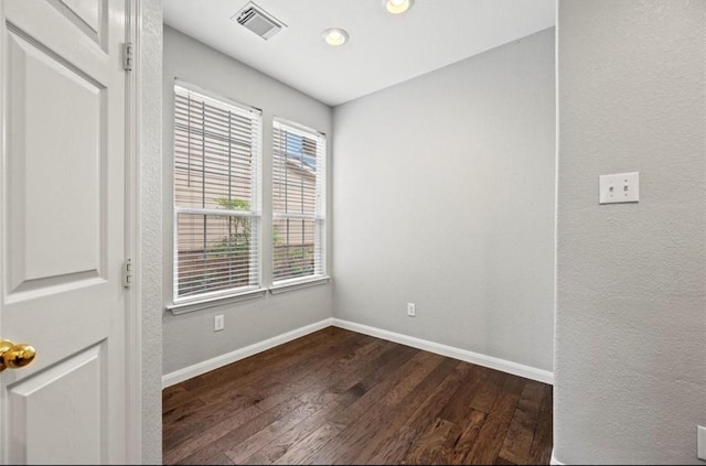 8814 Silent Willow Ln, Sugar Land, TX 77479 - spare room featuring dark wood-style floors and recessed lighting