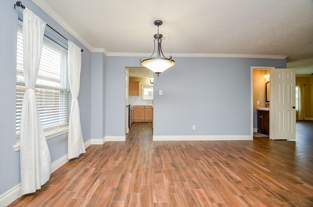 15018 Moss Boulder Ct, Houston, TX 77084 - spare room featuring wood finished floors and crown molding