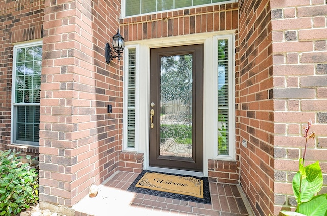 15018 Moss Boulder Ct, Houston, TX 77084 - view of exterior entry featuring brick siding