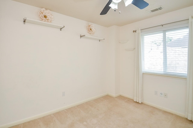 15018 Moss Boulder Ct, Houston, TX 77084 - spare room featuring light colored carpet and ceiling fan
