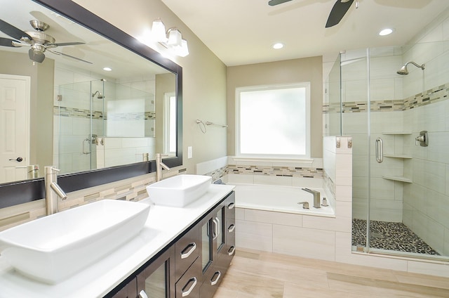 15018 Moss Boulder Ct, Houston, TX 77084 - full bath featuring a ceiling fan, a stall shower, a garden tub, double vanity, and recessed lighting