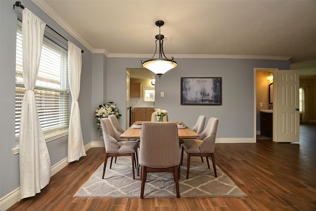 15018 Moss Boulder Ct, Houston, TX 77084 - dining space with dark wood-type flooring and ornamental molding