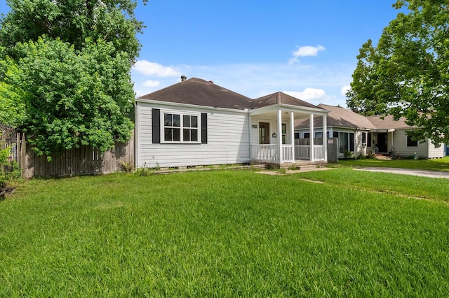 1922 Des Jardines St, Houston, TX 77023 - view of front facade featuring covered porch, a shingled roof, and crawl space