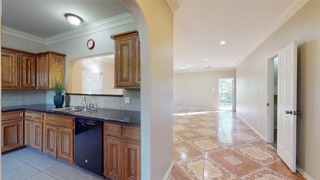 4106 Friar Point Rd, Houston, TX 77047 - kitchen featuring black dishwasher, light tile patterned floors, decorative backsplash, dark countertops, and brown cabinetry