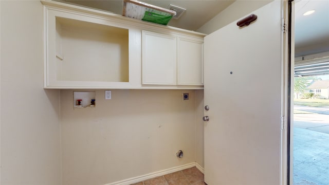 4106 Friar Point Rd, Houston, TX 77047 - laundry room with hookup for an electric dryer, hookup for a washing machine, and cabinet space