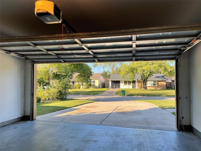 4106 Friar Point Rd, Houston, TX 77047 - garage featuring a garage door opener and a residential view