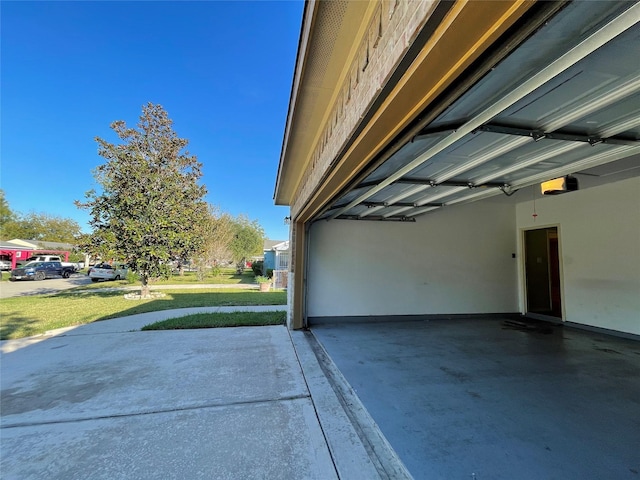 4106 Friar Point Rd, Houston, TX 77047 - garage featuring a garage door opener and a carport