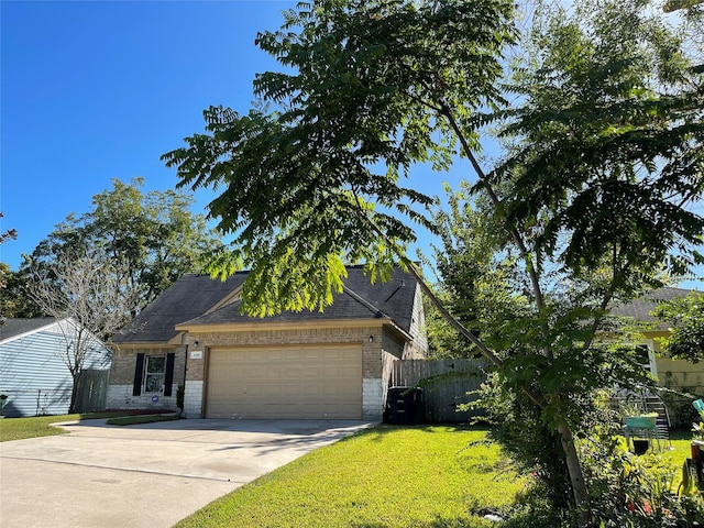 4106 Friar Point Rd, Houston, TX 77047 - view of front of house featuring brick siding, a garage, and driveway