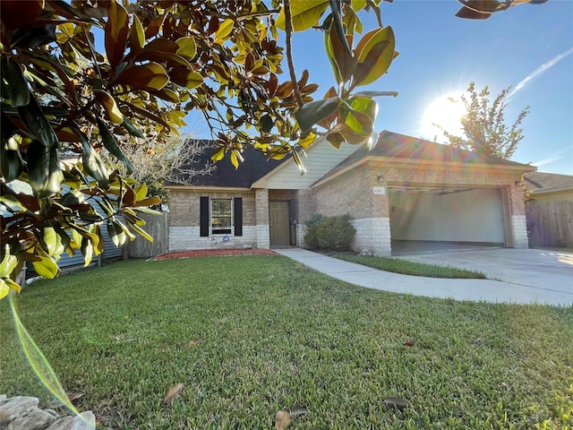 4106 Friar Point Rd, Houston, TX 77047 - view of front facade with brick siding, a garage, and driveway
