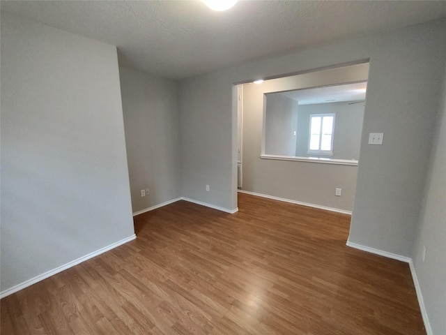 2518 Skyview Cove Ct, Houston, TX 77047 - empty room featuring wood finished floors