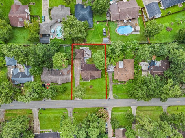 407 Gamewood Dr, Spring, TX 77386 - aerial view of residential area with property parcel outlined and a pool