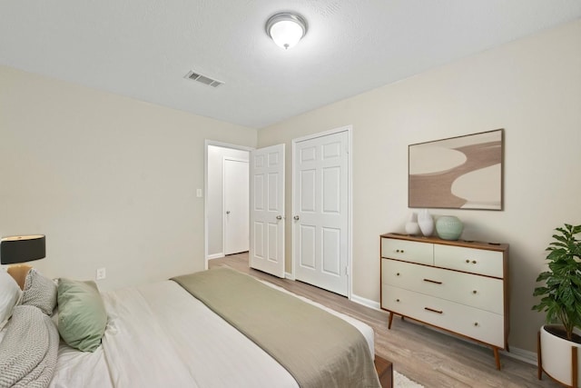 407 Gamewood Dr, Spring, TX 77386 - bedroom with wood finished floors and baseboards