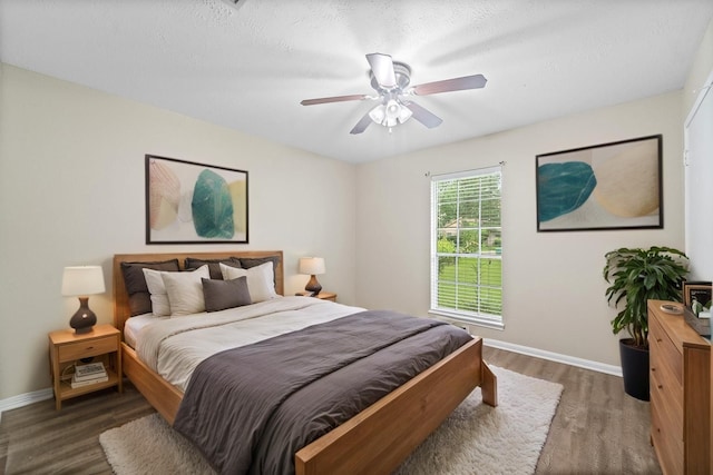 407 Gamewood Dr, Spring, TX 77386 - bedroom with wood finished floors and ceiling fan