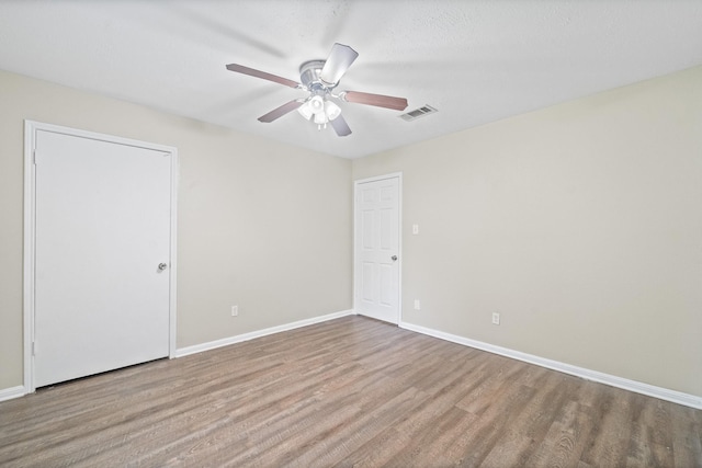 407 Gamewood Dr, Spring, TX 77386 - unfurnished bedroom featuring wood finished floors and ceiling fan
