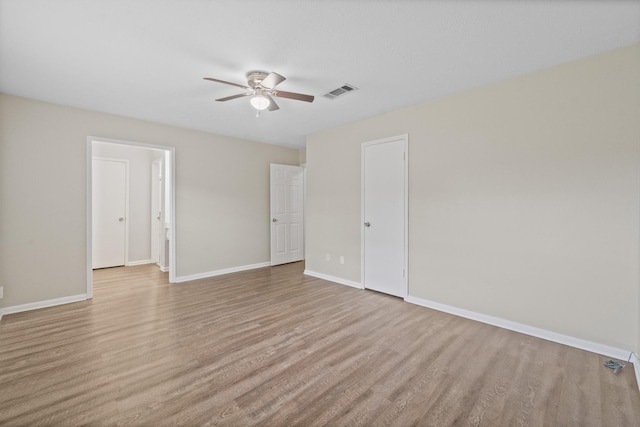 407 Gamewood Dr, Spring, TX 77386 - unfurnished bedroom with wood finished floors and a ceiling fan