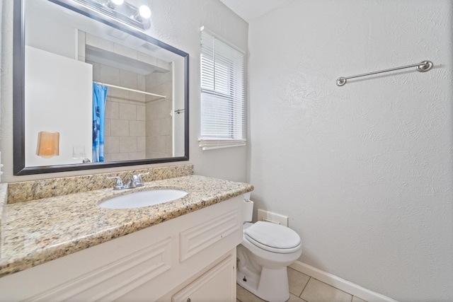 407 Gamewood Dr, Spring, TX 77386 - bathroom with tile patterned floors, vanity, curtained shower, and a textured wall