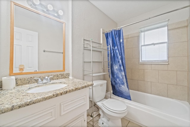 407 Gamewood Dr, Spring, TX 77386 - full bath with a textured wall, vanity, shower / tub combo with curtain, and tile patterned floors
