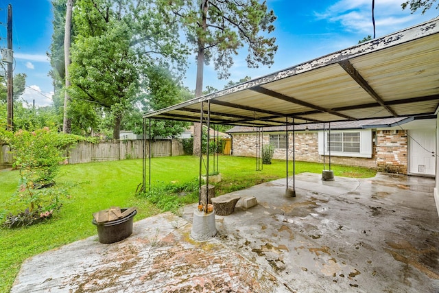 407 Gamewood Dr, Spring, TX 77386 - fenced backyard with a patio area
