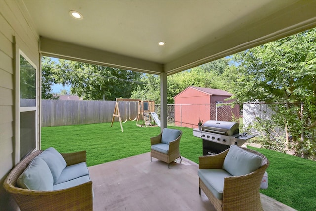 3534 Cork Dr, Houston, TX 77047 - fenced backyard with a patio, area for grilling, and a playground