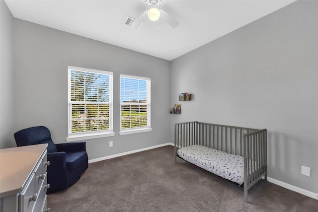 3534 Cork Dr, Houston, TX 77047 - bedroom featuring carpet floors, a crib, and a ceiling fan