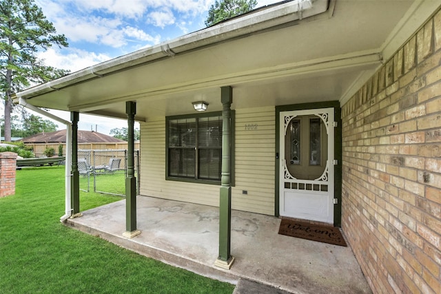 1002 Williams St, Cleveland, TX 77327 - view of exterior entry featuring a porch