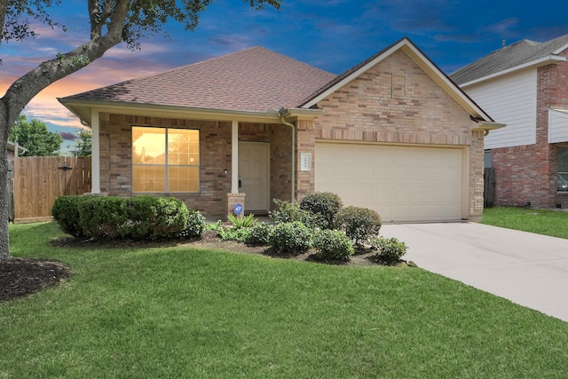 20234 Goss Hollow Ln, Katy, TX 77449 - ranch-style house with driveway, a garage, brick siding, and roof with shingles