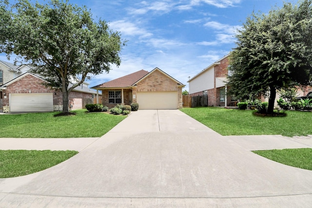 20234 Goss Hollow Ln, Katy, TX 77449 - view of front facade with an attached garage, concrete driveway, stone siding, and brick siding