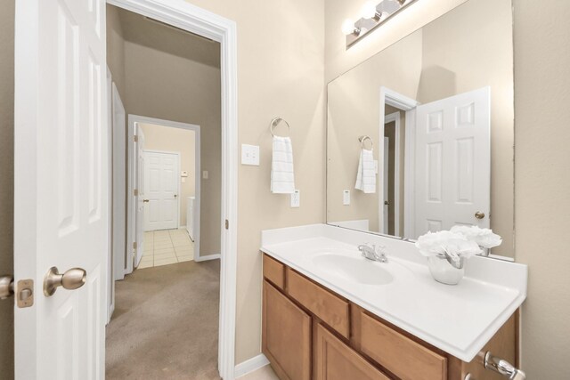 20234 Goss Hollow Ln, Katy, TX 77449 - bathroom featuring vanity and baseboards