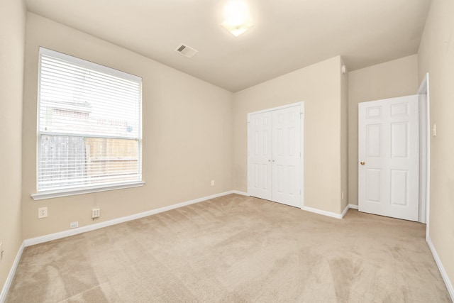 20234 Goss Hollow Ln, Katy, TX 77449 - unfurnished bedroom with light carpet and a closet