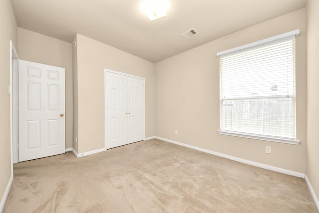 20234 Goss Hollow Ln, Katy, TX 77449 - unfurnished bedroom with light carpet and a closet