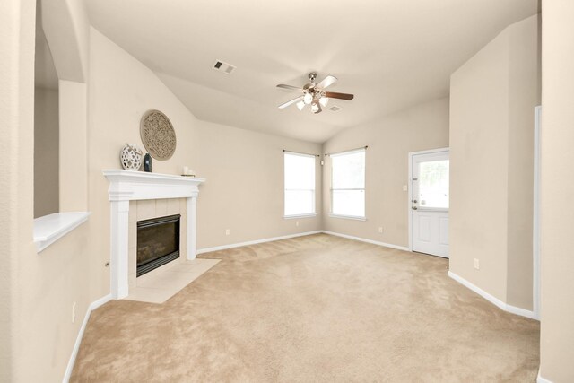 20234 Goss Hollow Ln, Katy, TX 77449 - unfurnished living room with ceiling fan, carpet flooring, a fireplace, and lofted ceiling