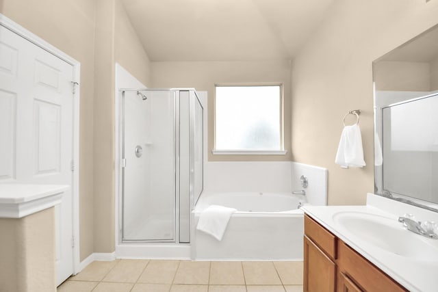 20234 Goss Hollow Ln, Katy, TX 77449 - full bathroom with a shower stall, vanity, a bath, and tile patterned floors