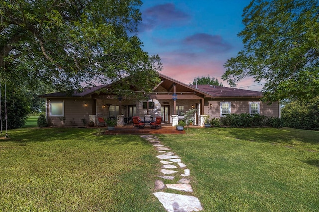 194 2 Mile Ln, Smithville, TX 78957 - back of property featuring a yard