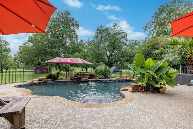 194 2 Mile Ln, Smithville, TX 78957 - view of pool featuring a fenced backyard, a patio area, and view of wooded area