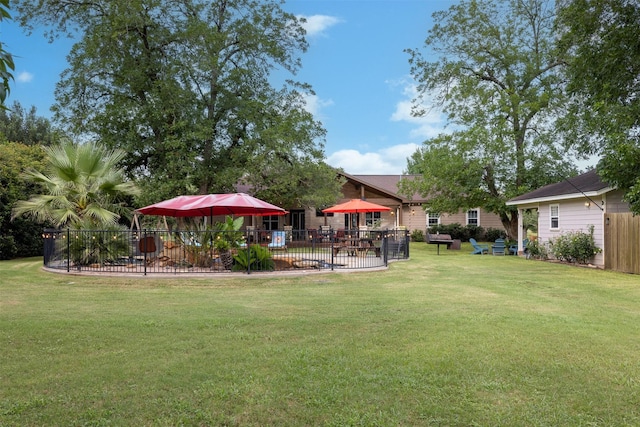 194 2 Mile Ln, Smithville, TX 78957 - view of yard with a patio area