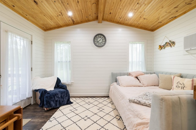 194 2 Mile Ln, Smithville, TX 78957 - living room with lofted ceiling, wood ceiling, wood finished floors, and wood walls