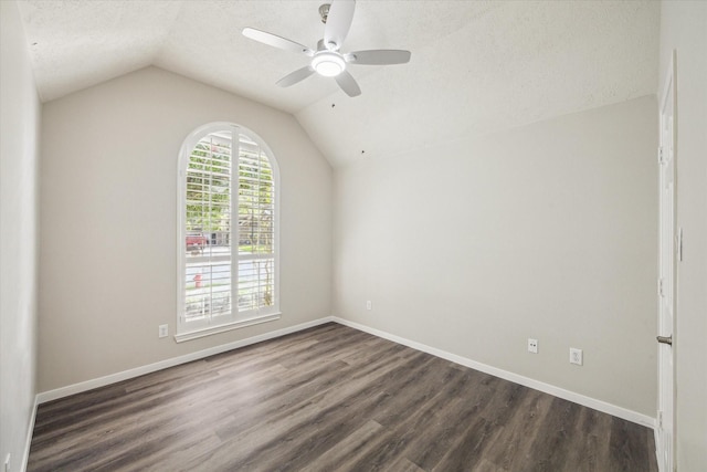 12319 Georgetown Park Ct, Houston, TX 77058 - unfurnished room featuring ceiling fan, a textured ceiling, dark wood-style flooring, and vaulted ceiling