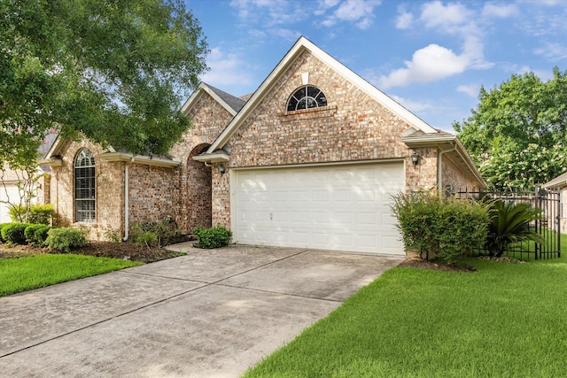 12319 Georgetown Park Ct, Houston, TX 77058 - view of front facade featuring concrete driveway, an attached garage, and brick siding