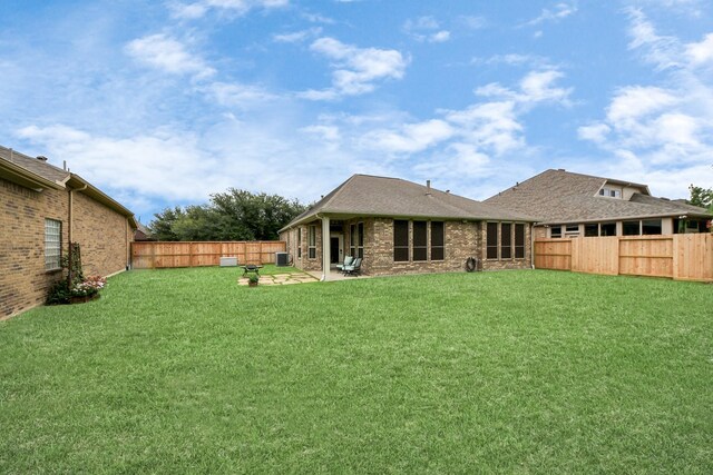 9419 Pecos Pass Ct, Cypress, TX 77433 - back of property featuring a fenced backyard and a patio