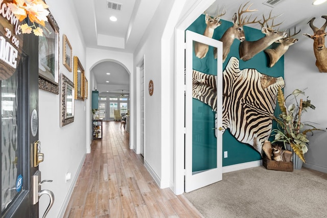 29126 Sage Meadow Trl, Fulshear, TX 77441 - hallway featuring arched walkways, recessed lighting, and wood finished floors