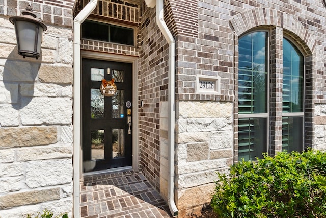 29126 Sage Meadow Trl, Fulshear, TX 77441 - entrance to property featuring brick siding and stone siding