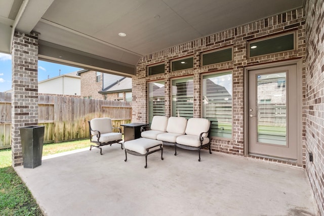29126 Sage Meadow Trl, Fulshear, TX 77441 - view of patio / terrace featuring an outdoor hangout area